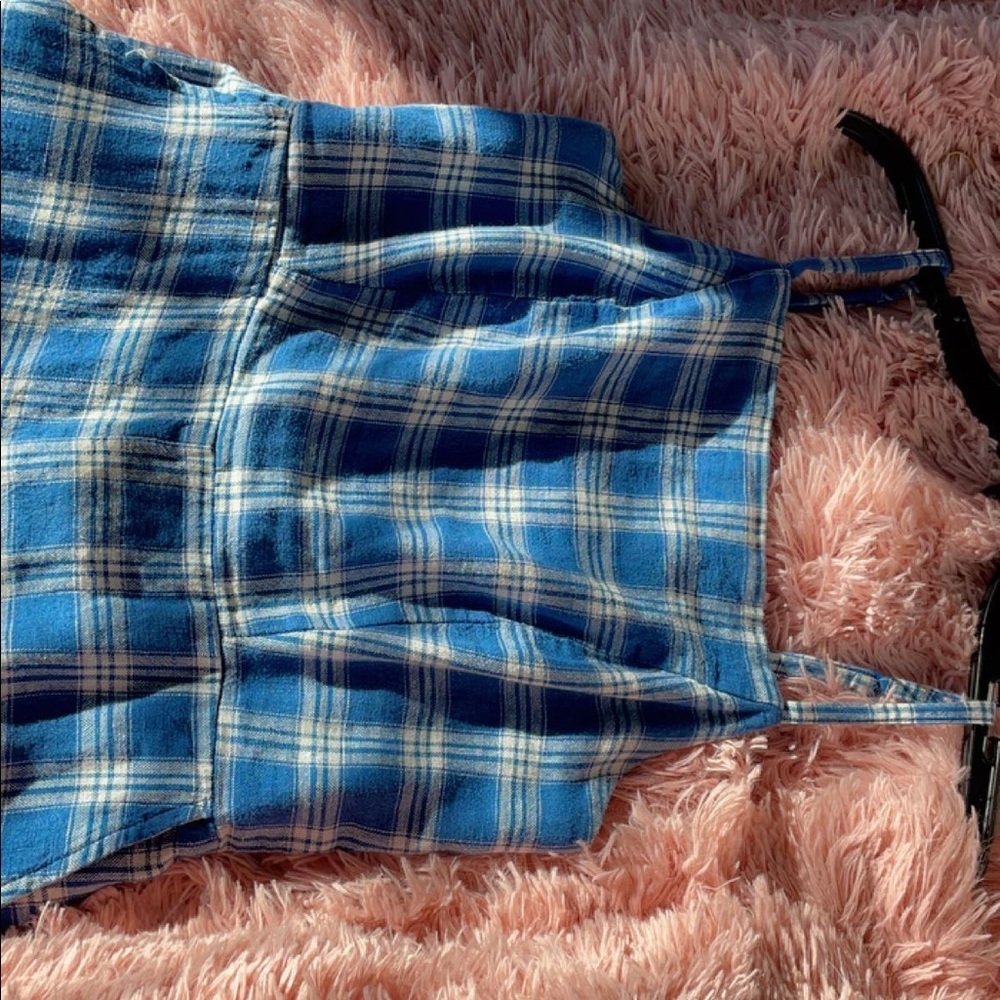 Blue striped jumpsuit with packets